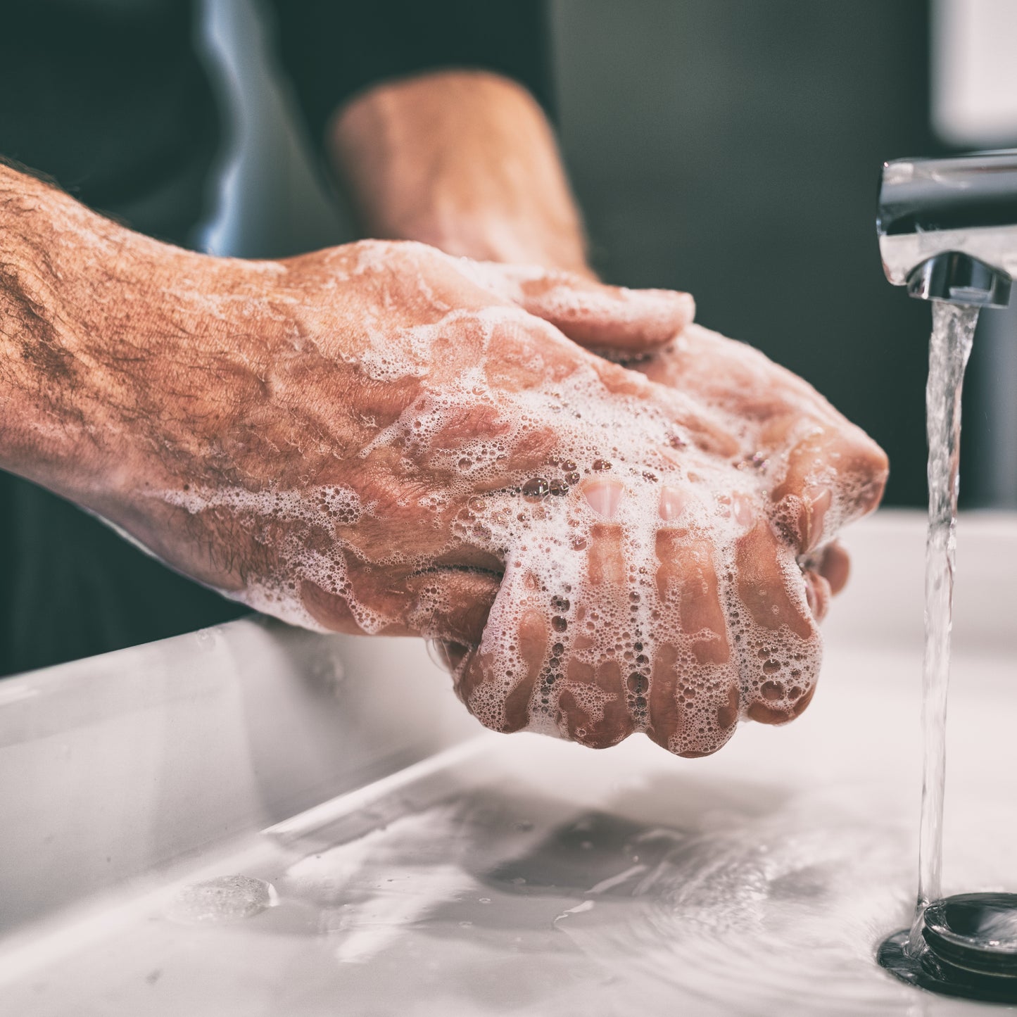 Man washing hands with Majestic Lather Bar Soap